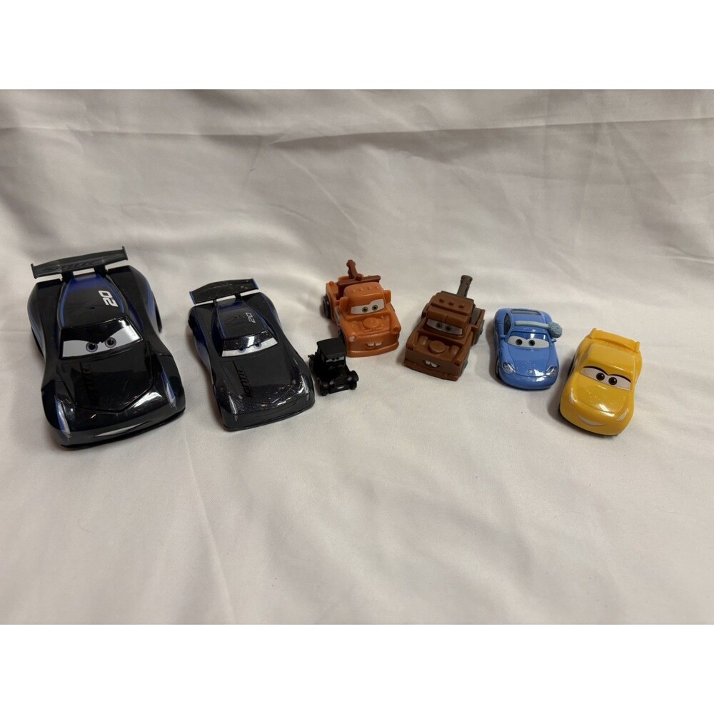 Disney Pixar Cars Mixed Lot Of 7 Race Cars Plastic and Metal Cars
